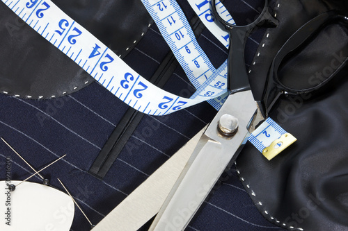 Foto: Still life hand stitched suit lining. Still life hand stitched suit lining.