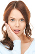 woman with hand over mouth