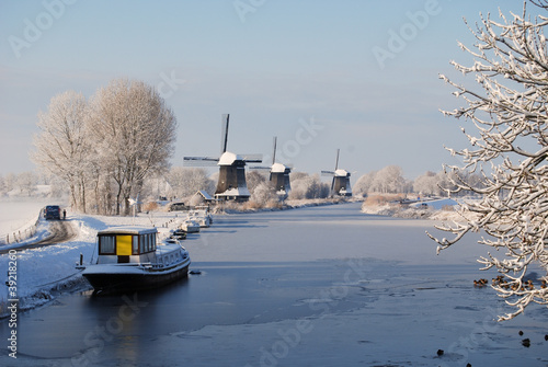Photo: winter landscape with windmills winter landscape with windmills
