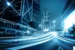 moving car with blur light through city at night