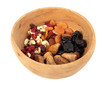 Bowl of mixed dried fruits in wooden bowl