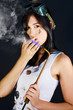 Woman Welding Smoking Cigarette