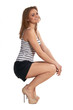 A young woman in shorts