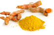 Turmeric root and powder on white background