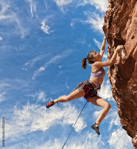 Photo: Rock climber dangling. Rock climber dangling.