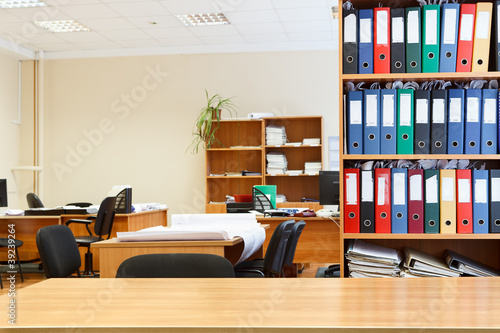 Photo: Modern office interior with tables, chairs and bookcases Nobody Modern office interior with tables, chairs and bookcases Nobody