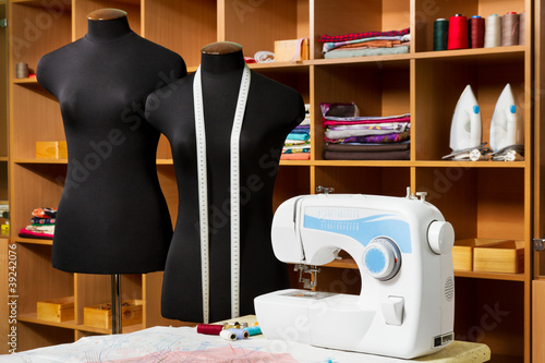 Photo: Fashion designer studio with dressmakers professional equipment Fashion designer studio with dressmakers professional equipment