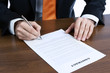 Businessman signing a contract