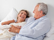 Couple Relaxing in Bed