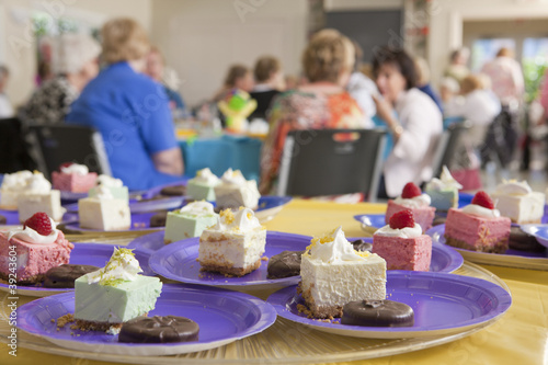 Photo: Dessert dishes at a lady's luncheon with senior women Dessert dishes at a lady's luncheon with senior women