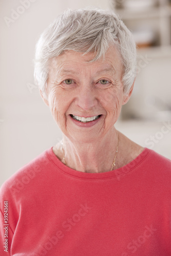 Photo: Portrait of a senior woman smiling Portrait of a senior woman smiling