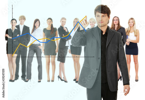 Photo: Young happy businesswoman pointing growth on graph Young happy businesswoman pointing growth on graph