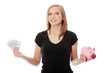 Happy teen holding a piggy bank and dollars