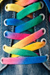Foto: Bright colorful shoelace and sneakers Bright colorful shoelace and sneakers