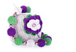 Ball of cotton yarn with flower and necklace on white background