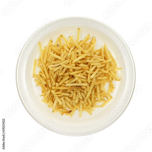 Photo: Shoestring potatoes on white plate Shoestring potatoes on white plate