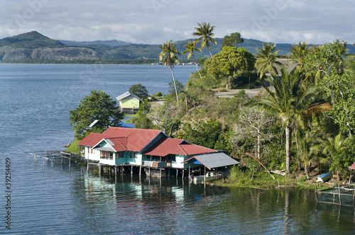Photo: House on an island on the lake of Sentani House on an island on the lake of Sentani