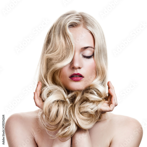 Photo: Beautiful Blonde Girl. Healthy Long Curly Hair. Beautiful Blonde Girl. Healthy Long Curly Hair.