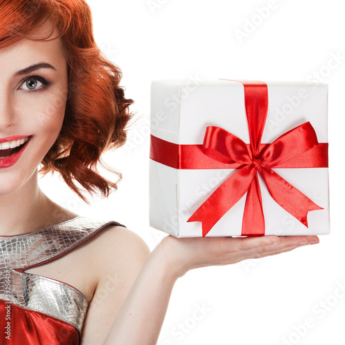 Photo: Young happy woman with a gift Young happy woman with a gift
