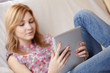 woman holding a touchpad pc