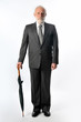 Photo: an english gentleman with umbrella an english gentleman with umbrella