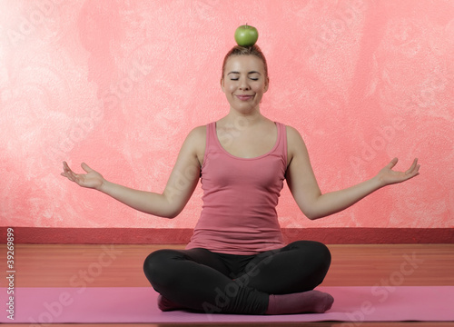 Photo: A pretty girl doing yoga A pretty girl doing yoga