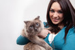 Foto: Cute woman and funny cat Cute woman and funny cat