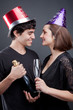 Young couple celebrating New Year's Eve