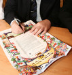 Rabbi signs contract between the newlyweds on the Jewish wedding