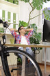 green office: businessman with bicycle at office