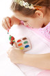 Foto: Child painting Easter eggs Child painting Easter eggs