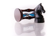 Black chess horse with sand-clock