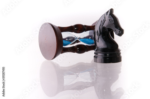 Photo: Black chess horse with sand-clock Black chess horse with sand-clock
