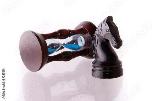 Photo: Black chess horse with sand-clock Black chess horse with sand-clock