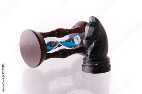 Photo: Black chess horse with sand-clock Black chess horse with sand-clock