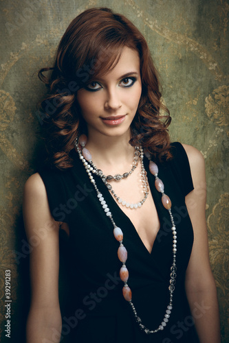 Photo: Portrait of pretty young woman Portrait of pretty young woman