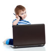 Child with laptop and mobile phone