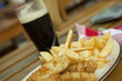 Photo: Fish and chips with dark beer Fish and chips with dark beer