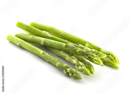 Photo: Asparagus on the white background Asparagus on the white background