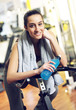 Portrait of a relaxed attractive young woman after exercise