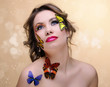 Foto: fashion woman with professional make-up,butterflyies fashion woman with professional make-up,butterflyies