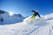 Foto: skiing on fresh snow at winter season at beautiful sunny day skiing on fresh snow at winter season at beautiful sunny day