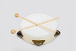 Wooden tambourine on a white background
