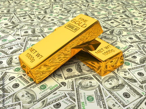 Photo: Gold bars on dollars Gold bars on dollars