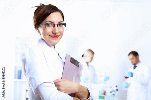 Photo: Scientists in laboratory Scientists in laboratory
