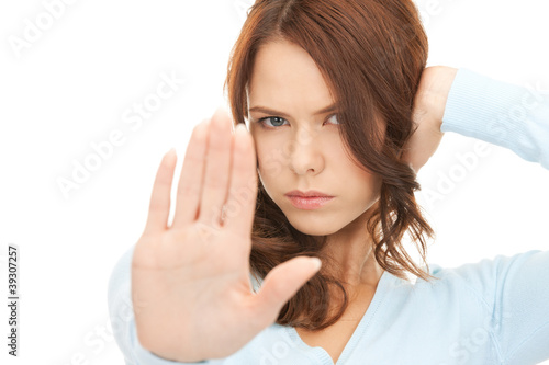 Photo: woman making stop gesture woman making stop gesture