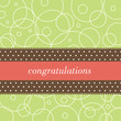 Square card with the word congratulations on a polka dot ribbon