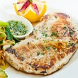 Sworfish steak with steamed vegetables and spices