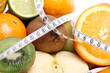 Fresh fruits and measure tape Fresh fruits and measure tape