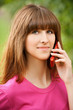 Photo: Young girl talking at the cell phone Young girl talking at the cell phone